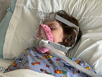 Sophia in bed w/ EEG Testing