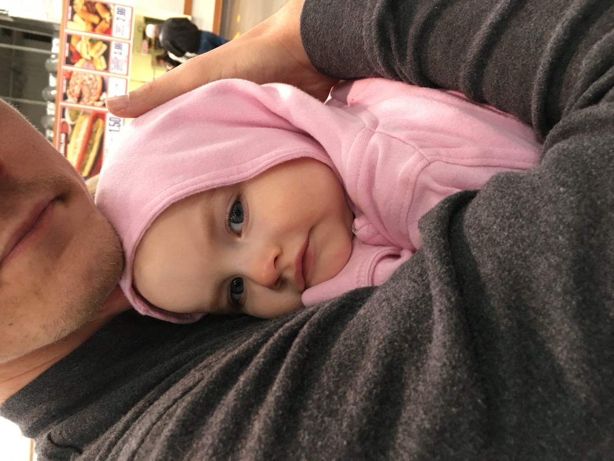 Baby Sophia bundled in a pink hoodie in 2015