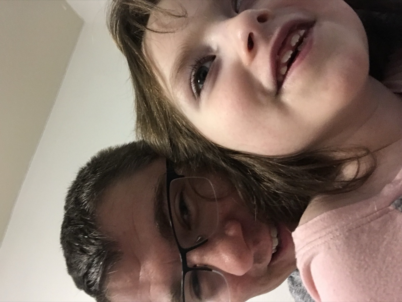 Sophia smiling with Dad in 2021