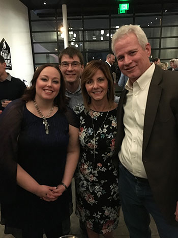 Sophia's parents and grandparents at a fundraiser venue