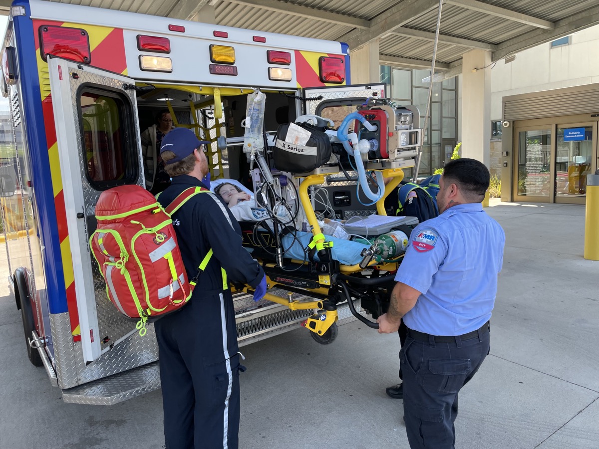 Sophia being transported by emergency medical services in 2023