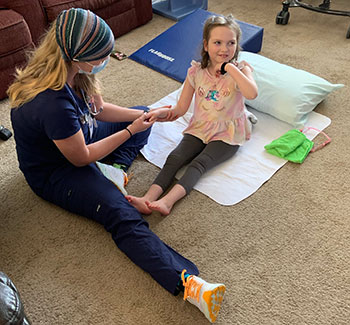 Sophia with nursing care